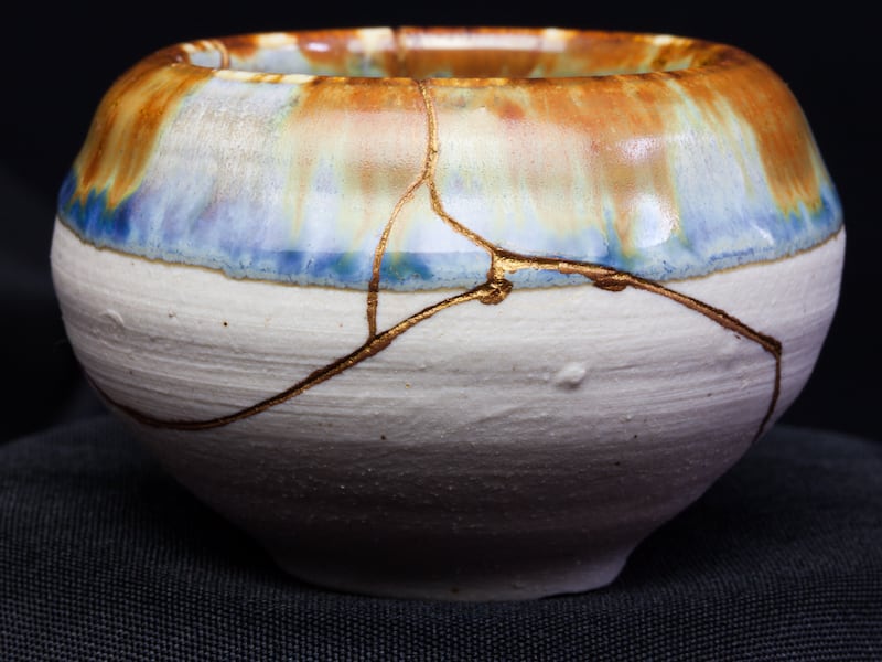 Kintsugi is the ancient Japanese art of repairing fractured pottery by using a form of resin mixed with powdered gold.