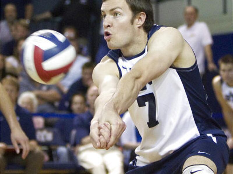 BYU men's volleyball outside hitter Jeff Robinson digs the ball during the Mountain Pacific Sports Federation Championship quarterfinal round against UCLA in Provo Saturday. BYU won, 3-1.