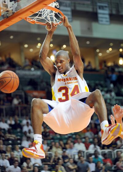 In this photo released by McDonald's, McDonald's All American East player Derrick Favors, of Atlanta, Ga., scores the final two points of the game in the East's 113-110 win over the West team in the McDonald's All American Boys Game, Wednesday, April 1, 2