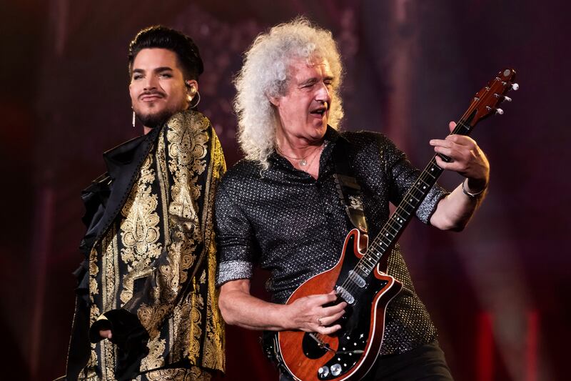 FILE - In this Sept. 28, 2019 file photo, Adam Lambert, left, and Brian May, of Queen, perform at the Global Citizen Festival in New York. Lambert and May, along with bandmate Roger Taylor, recently gathered virtually to record a new version of the Queen classic, “We Are the Champions.”