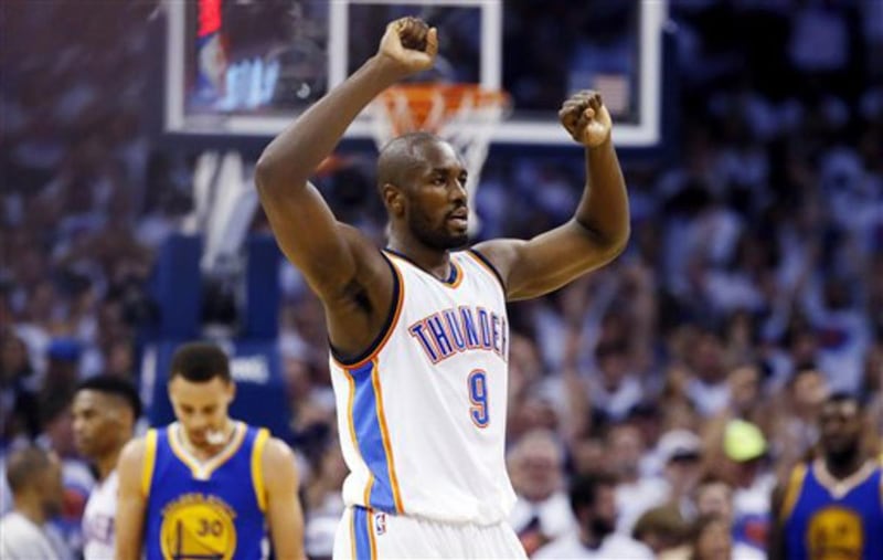 Oklahoma City Thunder forward Serge Ibaka (9) reacts to action against the Golden State Warriors in Game 4 of the NBA basketball Western Conference finals in Oklahoma City, Tuesday, May 24, 2016. (AP Photo/Sue Ogrocki)