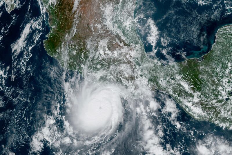 A satellite image that shows Hurricane Otis approaching Mexico’s Pacific coast near Acapulco.