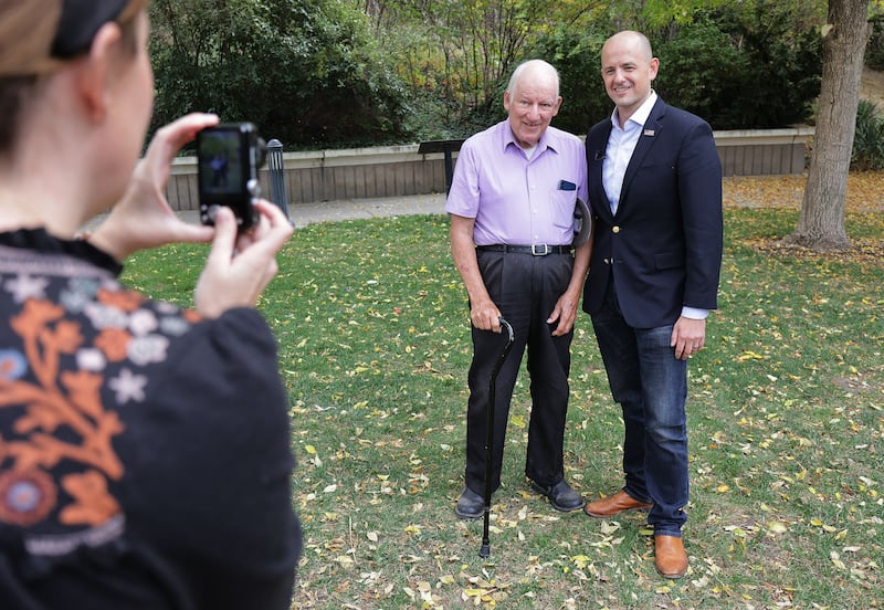 A photo is taken of Evan McMullin and Arnold Thayer in Salt Lake City.