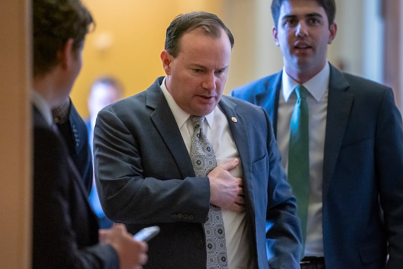 Sen. Mike Lee, R-Utah, leaves a Republican lunch meeting and heads to the chamber where he voted to reject President Donald Trump’s declaration of a national emergency at the southwest border, at the Capitol in Washington, Thursday, March 14, 2019. Twelve Republicans joined Democrats in defying Trump. (AP Photo/J. Scott Applewhite)