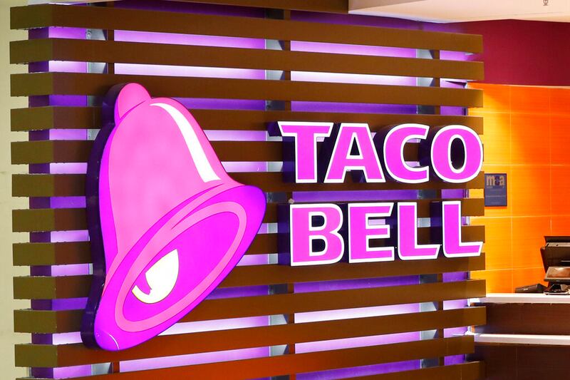 A Taco Bell logo at a restaurant in Miami.