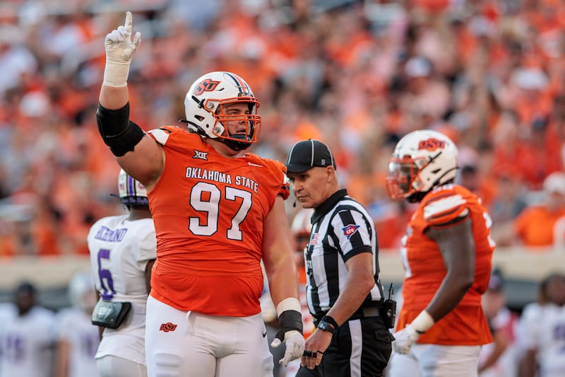 Oklahoma State Cowboys nose tackle Justin Kirkland (97) reacts after a play against the Central Arkansas Bears at Boone Pickens Stadium on Sept., 02 2023, in Stillwater, Okla.