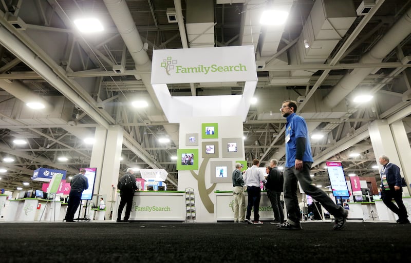 Vendors and attendees move around the exhibit hall as RootsTech opens at the Salt Palace in Salt Lake City in 2020.