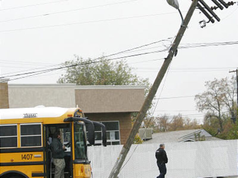 A Canyons School District bus driver hit a power pole during the snow storm in Midvale Tuesday.