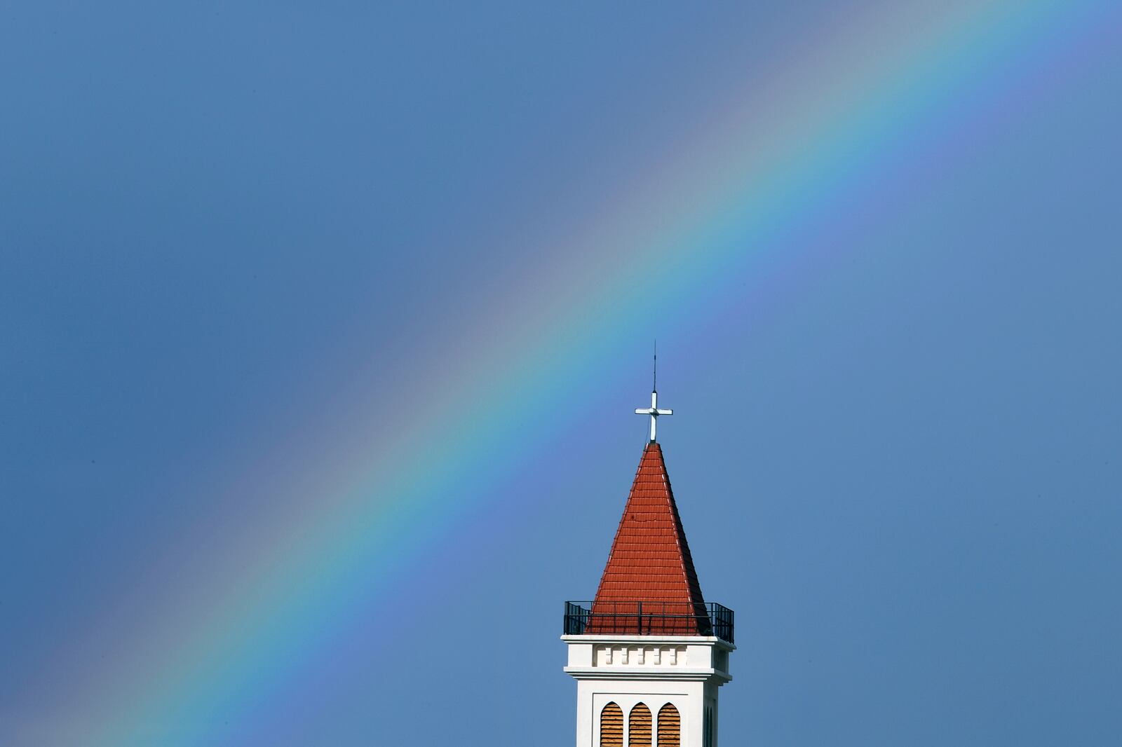 A rainbow arcs over a church in Beirut, Lebanon.