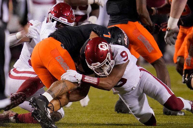 Oklahoma’s D.J. Graham (9) is one of 13 players from FBS programs who transferred to Utah State in the offseason.