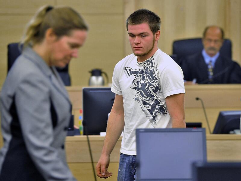 In this May 22, 2013 file photo, Kyle Dube, 20, walks into Superior Court in Bangor, Maine one day after he was charged with killing 15-year-old Nichole Cable. Dube's trial is expected to begin Monday, Feb. 23, 2015 in Bangor and last two weeks.