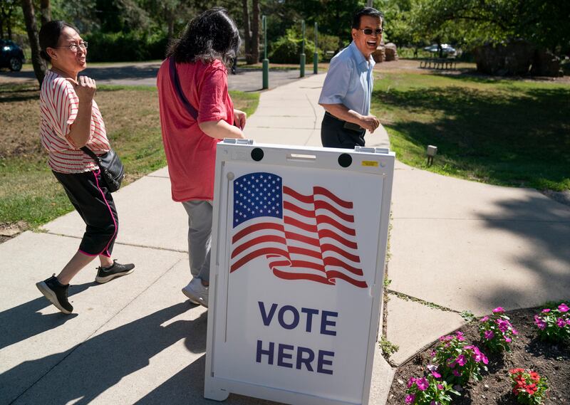 Luz Santa Maria, 69, of Troy, voted with her daughter Lerissa Santa Maria, 40, and husband Eli Santa Maria, 75, in the Michigan primary at the Lloyd A. Stage Nature Center.