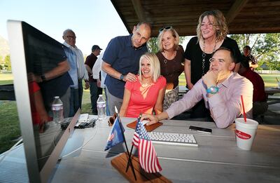 Rep. John Curtis, R-Utah, his, wife Sue, center, and staff members watch primary election results for the 3rd Congressional District in Provo on Tuesday, June 26, 2018.