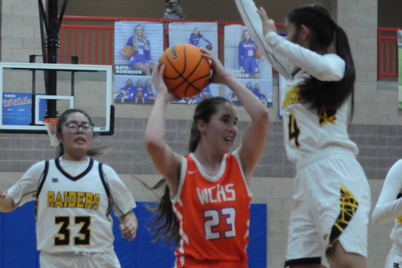 Whitehorse’s McKeeda Sam and Shelby Vasku put the pressure on Water Canyon’s Melissa Jessop during a 1A girls basketball quarterfinal game in Richfield.