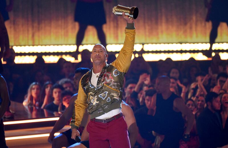 Dwayne Johnson, also known as The Rock, accepts the generation award at the MTV Movie and TV Awards on Saturday, June 15, 2019, at the Barker Hangar in Santa Monica, Calif.