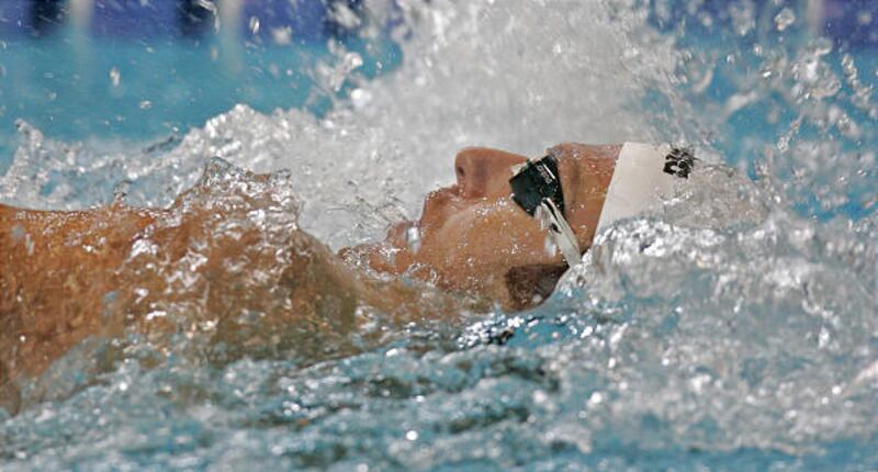 Aaron Peirsol swims in the finals of the men's 200-meter backstroke at the U.S. National swimming championships in Indianapolis Saturday. Peirsol set a world record with a time of 1:53.08.