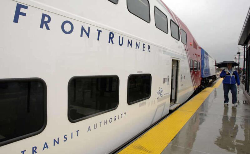 Passengers board the UTA Frontrunner train in Salt Lake City Thursday, Jan. 26, 2012.