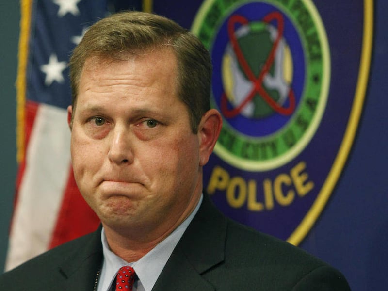 Houston Police Det. Mike Miller stands during a news conference about the investigation and arrest of suspect Mona Yvette Nelson in the disappearance and death of 12-year-old Jonathan Foster in Houston, Thursday, Dec. 30, 2010. Nelson, a family acquaintan