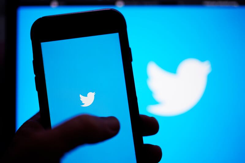 The Twitter application is seen on a digital device in San Diego.