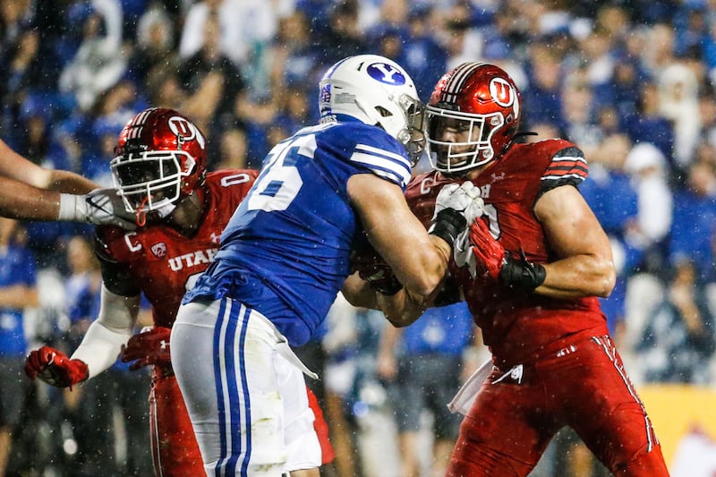 BYU and Utah compete during the second half of an NCAA college football game at LaVell Edwards Stadium in Provo on Saturday, Sept. 11, 2021. BYU won 26-17.