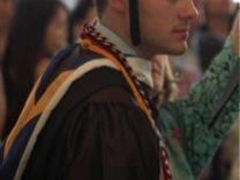 Kevin Coughlin, Suffolk University Class of 2012 prepares to accept his B.A. in English Literature with highest honors.