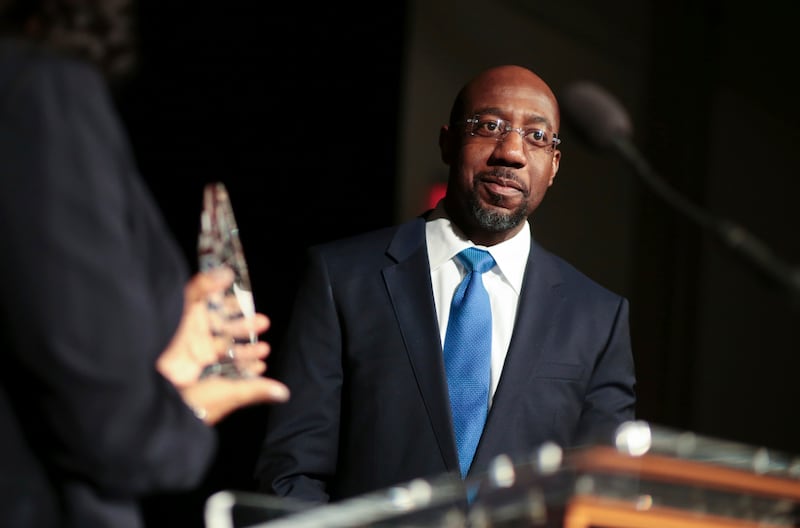 Pastor Raphael Gamaliel Warnock, of Ebenezer Baptist Church, receives an award n at the University of Georgia.