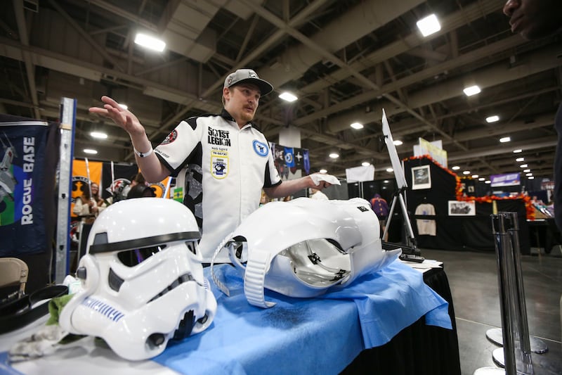 Ben Driggs, 26, of American Fork, answers questions while cleaning his cosplay gear during the FanX Spring Comic Convention at the Salt Palace Convention Center in Salt Lake City on Friday, April 19, 2019. Driggs is the member of the 501st Legion organiza
