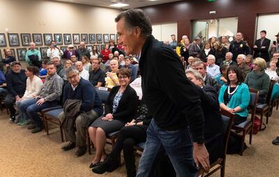 U.S. Senator Mitt Romney, R-Utah, walks into his first town hall meeting in Farmington on Tuesday, Jan. 22, 2019.