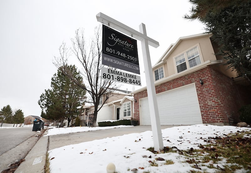 A home is listed for sale in West Jordan on Wednesday, Dec. 21, 2022.