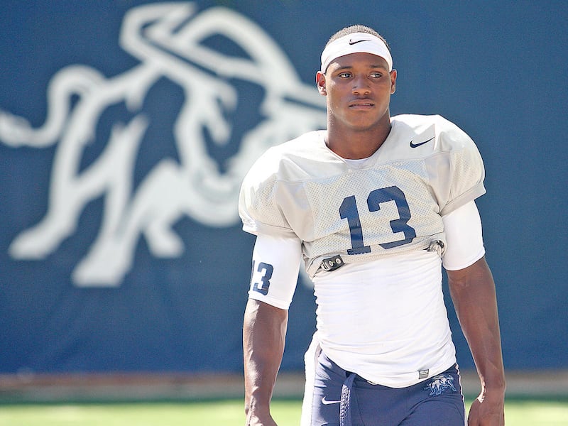 Utah State senior cornerback Jalen Davis walks off the field at the end of an Aggie practice at Maverik Stadium in Logan.