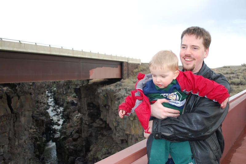 Josh Powell carries his youngest son, Braden, across a bridge over the Malad Gorge at Idaho's Thousand Springs
State Park. West Valley police recovered this image from one of Josh Powell's computers while investigating the Dec. 7, 2009, disappearance of