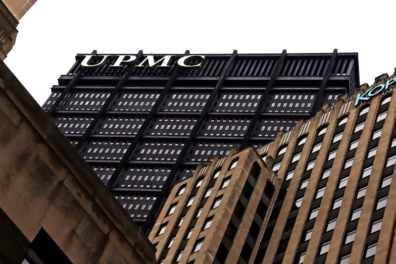 This is the University of Pittsburgh Medical Center headquarters in downtown Pittsburgh, Thursday, March 19, 2020. (AP Photo/Gene J. Puskar)