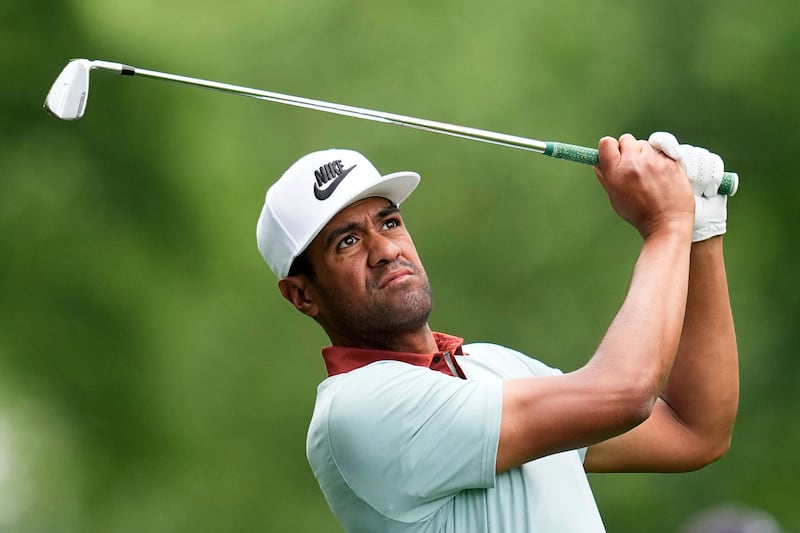 Tony Finau hits his tee shot on the second hole during a practice round for the PGA Championship golf tournament at the Quail Hollow Club, Wednesday, May 14, 2025, in Charlotte, N.C.