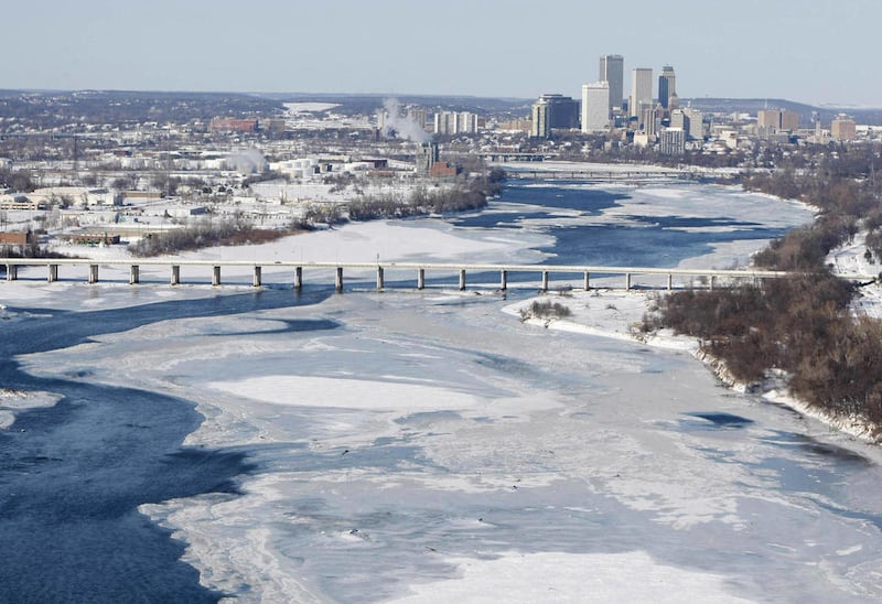An aerial of the Arkansas river and the skyline of Tulsa, Okla. after major winter storm on Wednesday, Feb. 2, 2011. The blizzard paralyzed Oklahoma on Tuesday with more than 20 inches of snow, sleet and ice before moving into the Midwest and on toward