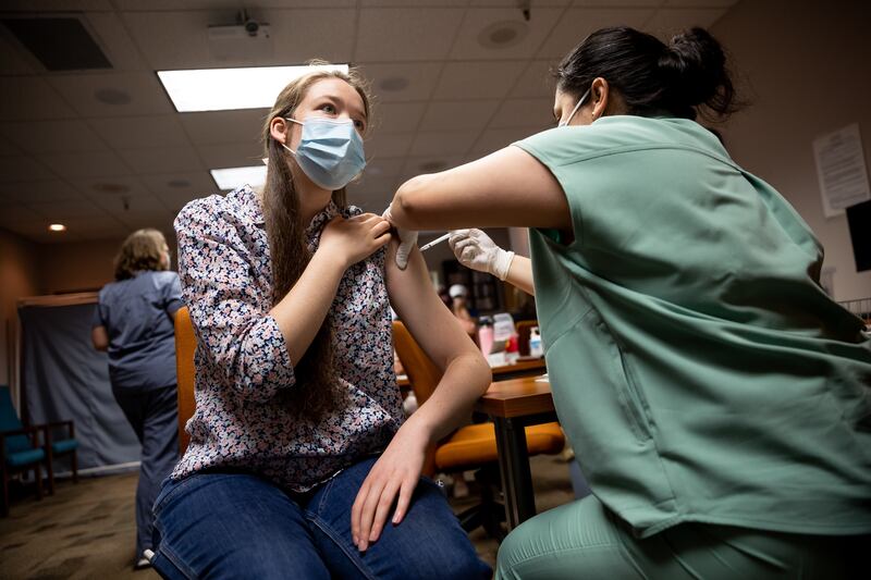 Brittney Johnson gets her second dose of the Pfizer-BioNTech COVID-19 vaccine.
