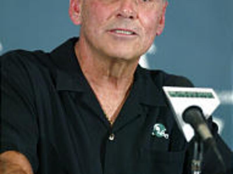 Michigan State football coach John L. Smith speaks to the media Wednesday after it was announced the former Utah State coach will not return to Michigan State next season.