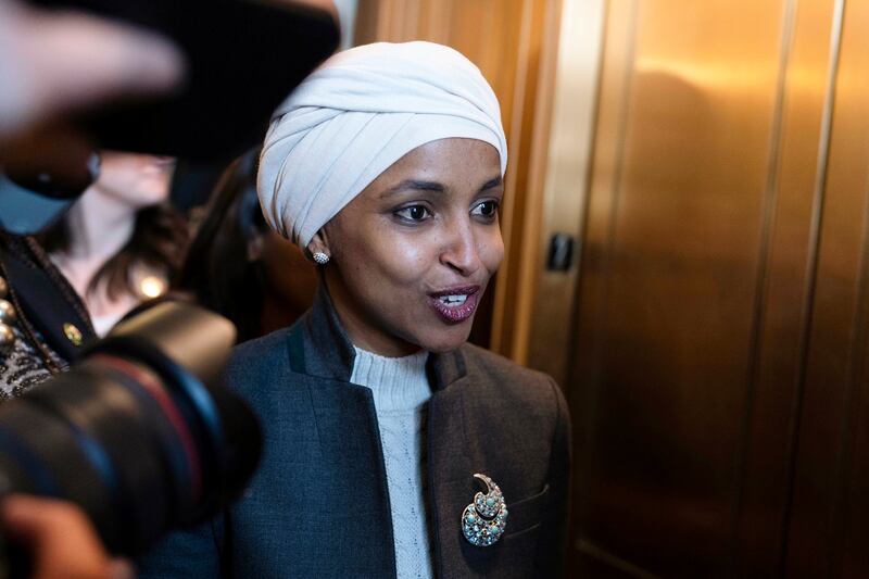 Rep. Ilhan Omar, D-Minn., leaves the House chamber at the Capitol in Washington.