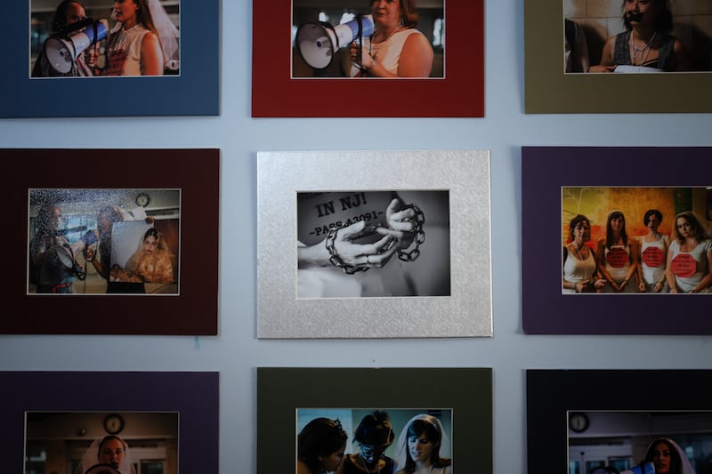 Pictures of a variety of protests by the organization Unchained at Last, are hung on the wall in their office. Fraidy Reiss is the founder and Executive Director of Unchained at Last, an organization dedicated to helping people being forced into marriage