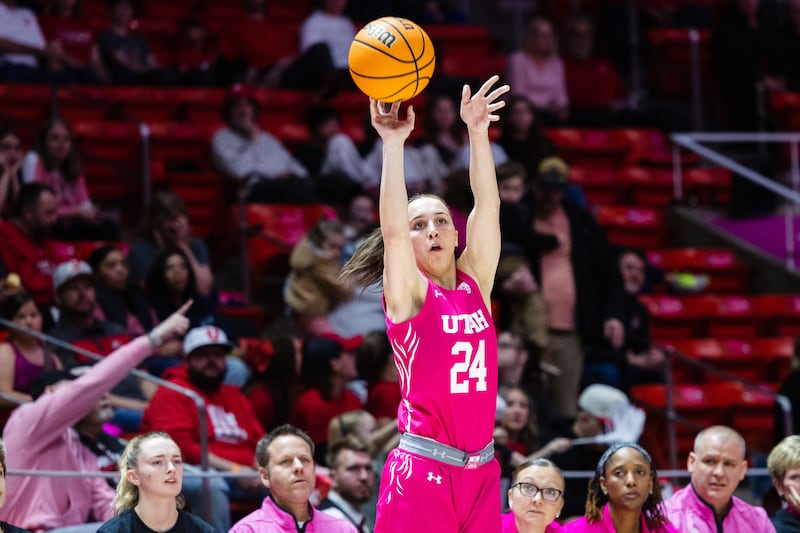 Utah Utes guard Kennady McQueen (24) shoots a three pointer during an NCAA women’s basketball game at the Huntsman Center.