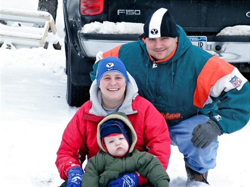 Jason Sheridan with his wife, Cresta, and their son, Quinton.