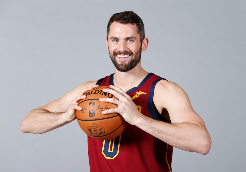 FILE - In this Sept. 24, 2018, file photo, Cleveland Cavaliers' Kevin Love poses for a portrait during the NBA basketball team's media day, in Independence, Ohio. From the outside, the Cavaliers’ All-Star forward appears to have it all: A model’s striking