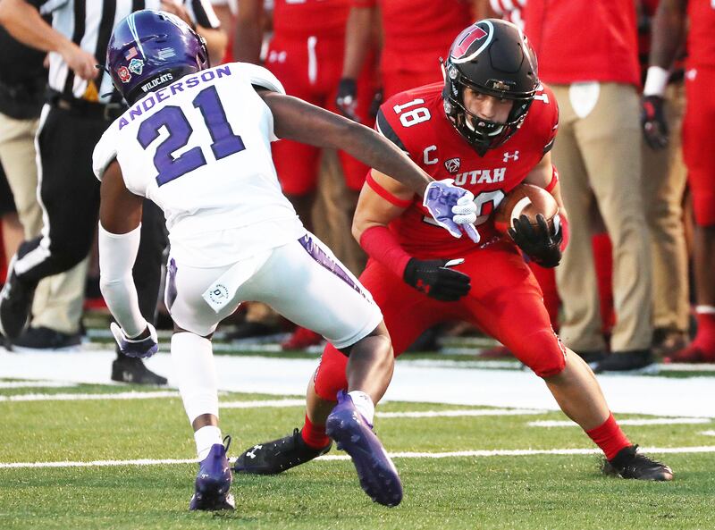 Utah Utes wide receiver Britain Covey carries the ball during the 2021 season opener at Rice-Eccles Stadium in Salt Lake City.