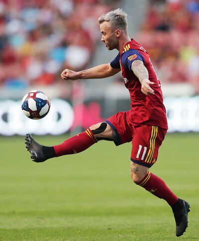 Real Salt Lake midfielder Albert Rusnak (11) jumps to control the ball as Real Salt Lake and New York City FC play at Rio Tinto Stadium in Sandy on Saturday, Aug. 3, 2019.