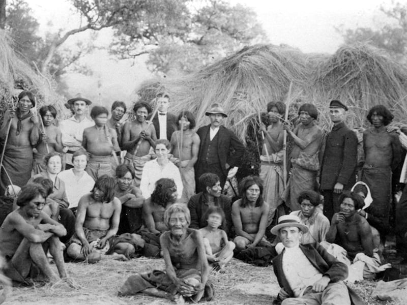 German-speaking Mennonite refugees from the Soviet Union with indigenous neighbors near the Fernheim Colony in northwest Paraguay in 1930.