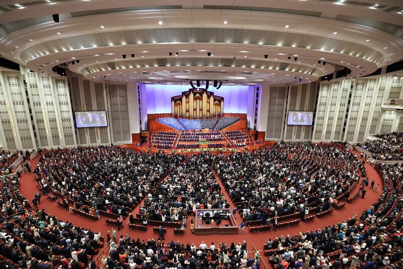 Conferencegoers sing during a session of the 193rd Annual General Conference of The Church of Jesus Christ of Latter-day Saints in Salt Lake City on April 2, 2023.