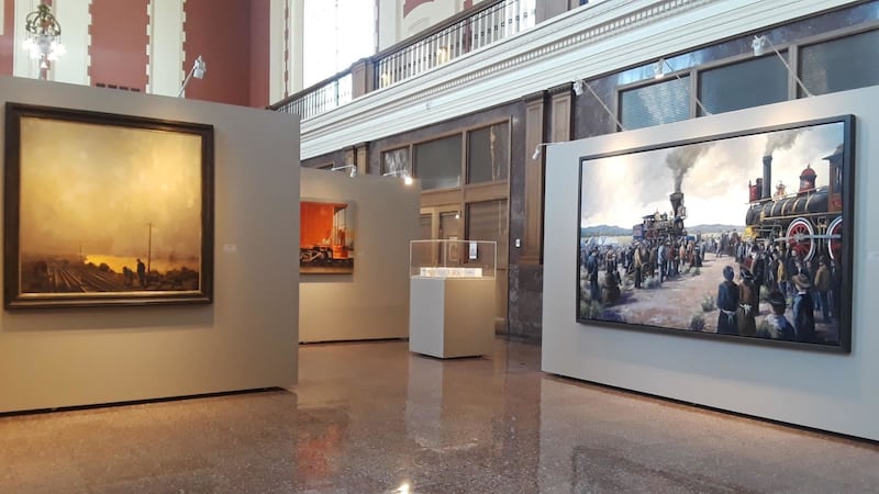 "The Golden Road," left, by David Koch and "Unified Together," (right) by Simon Winegar, are on display Rio Gallery as part of the "Transcontinental: People, Place, Impact" exhibit. This year marks the 150th anniversary of the completion of the Transconti