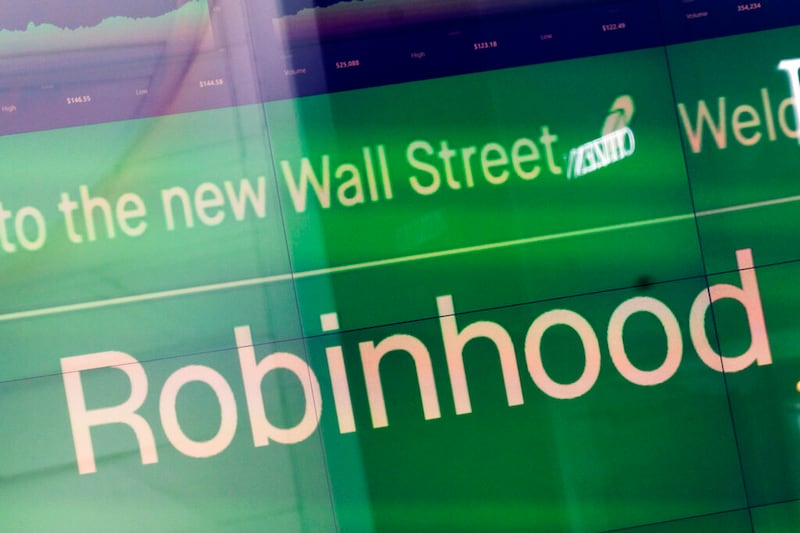 An electronic screen at Nasdaq displays Robinhood in New York’s Times Square