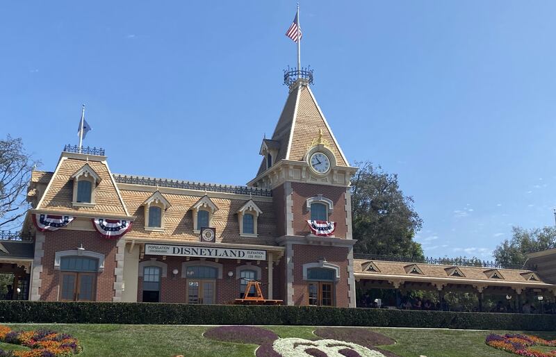 The Disneyland Railroad Main Street, U.S.A. train station sits just beyond the front gates of the park, welcoming guests into Disneyland.