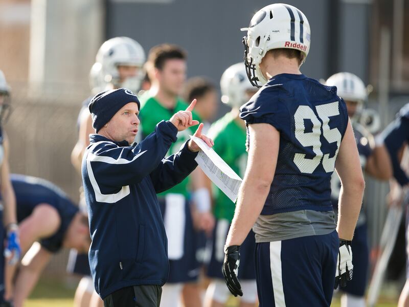 BYU tight ends coach Steve Clark instructs during spring camp in Provo.