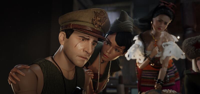 Carlala (Eiza Gonzalez, far right) and G.I. Julie (Janelle Monae, middle) comfort Cap’n Hogie (Steve Carell, left) in "Welcome to Marwen," the miraculous true story of one broken man’s fight as he discovers how artistic imagination can restore the human s